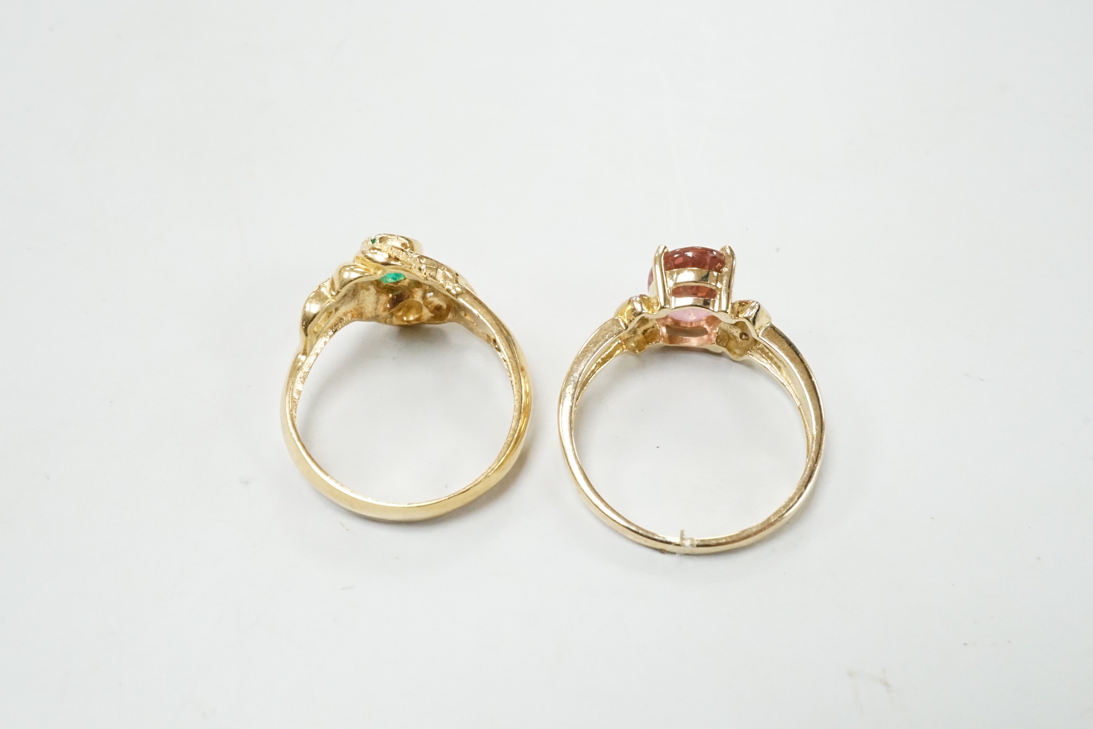 A modern yellow metal and single stone pear cut emerald set ring, size K, gross weight 3.9 grams, together with a modern 9ct gold, tourmaline and diamond set ring, size N/O, gross weight 2.5 grams.